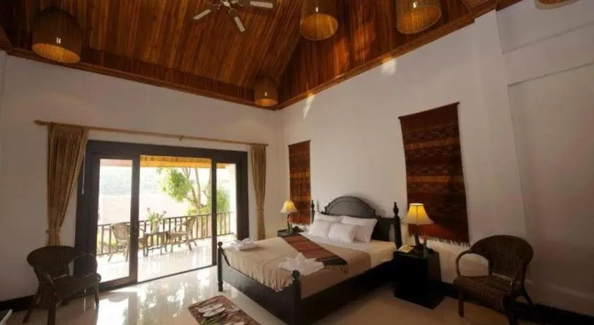 Bed in Nam Ou Riverside Resort