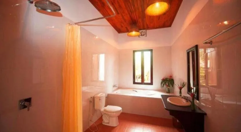 Bed in Nam Ou Riverside Resort