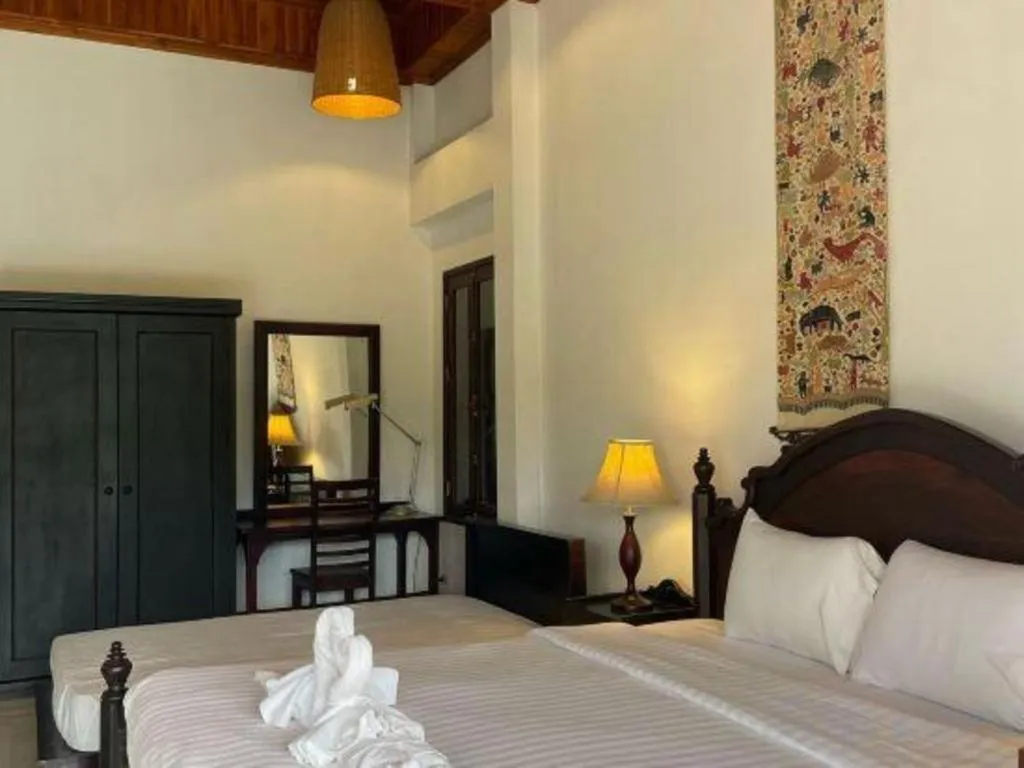 Bed in Nam Ou Riverside Resort