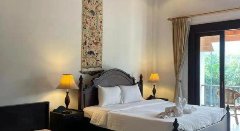 Bed in Nam Ou Riverside Resort