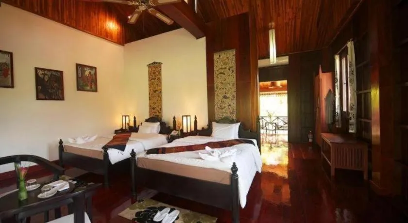 Bed in Nam Ou Riverside Resort