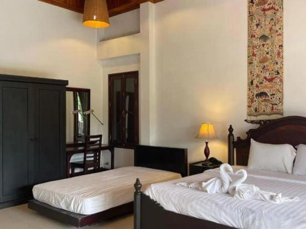 Bed in Nam Ou Riverside Resort