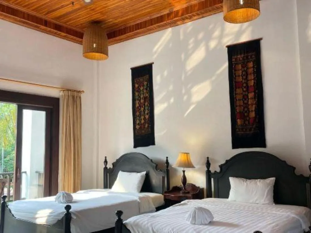 Bed in Nam Ou Riverside Resort