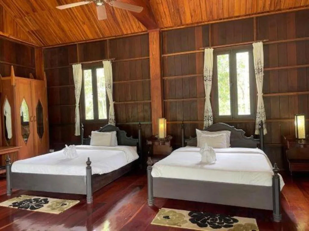 Bed in Nam Ou Riverside Resort