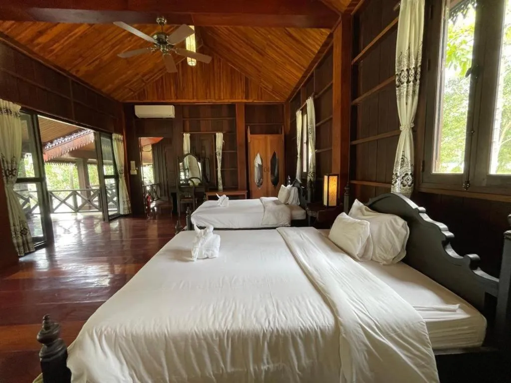 Bed in Nam Ou Riverside Resort