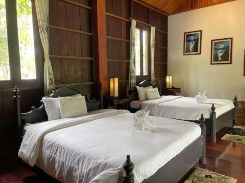 Bed in Nam Ou Riverside Resort