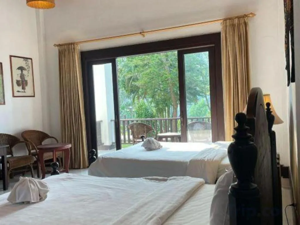 Bed in Nam Ou Riverside Resort