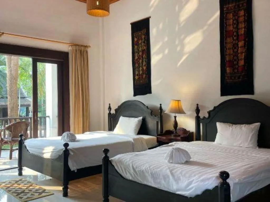 Bed in Nam Ou Riverside Resort
