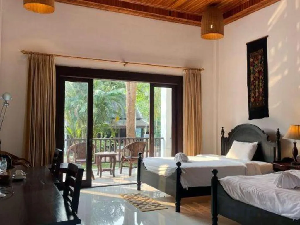 Bed in Nam Ou Riverside Resort