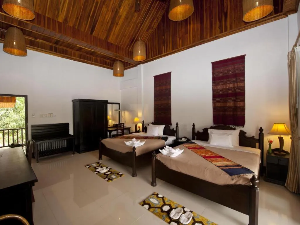 Bed in Nam Ou Riverside Resort