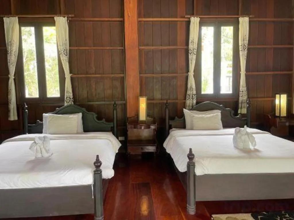 Bed in Nam Ou Riverside Resort