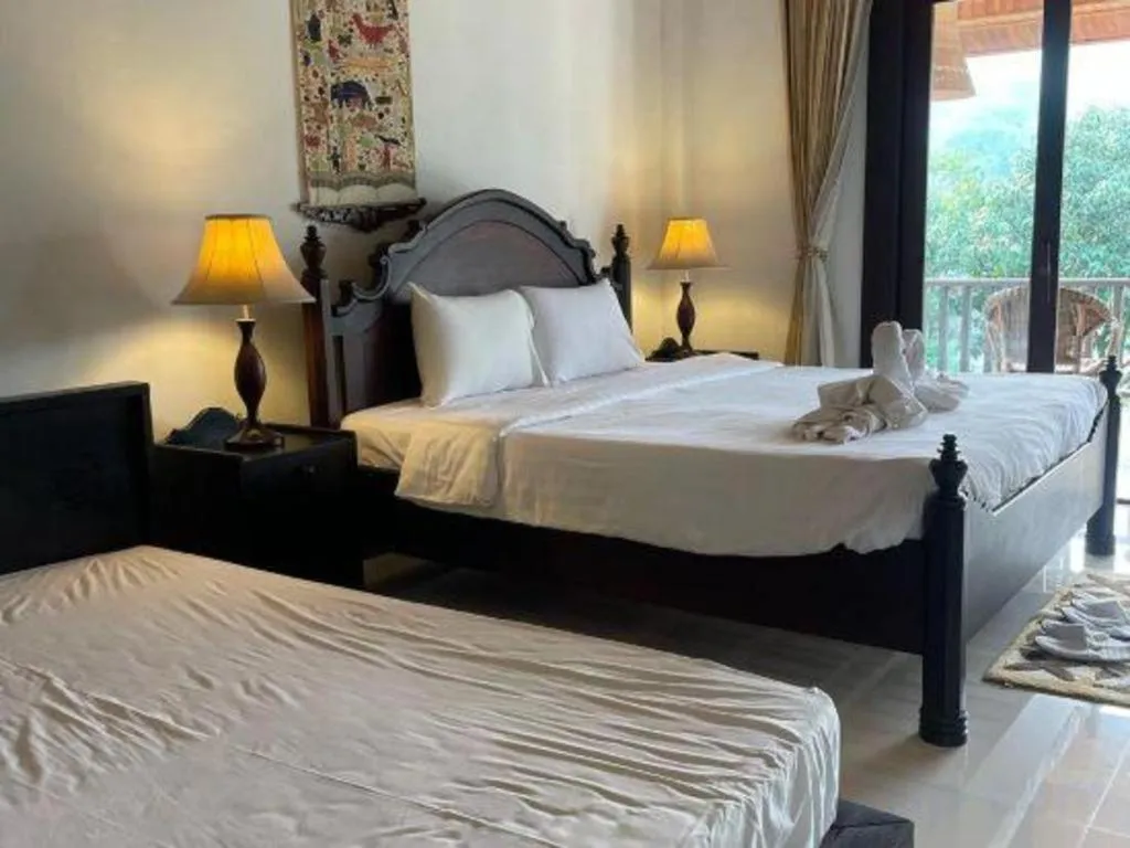 Bed in Nam Ou Riverside Resort