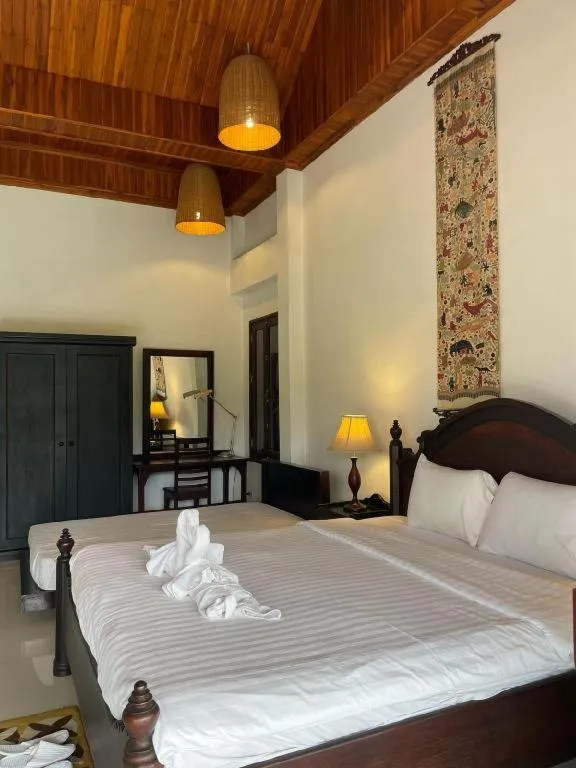 Bed in Nam Ou Riverside Resort