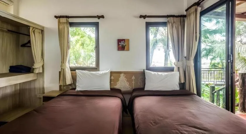 Bed in Na Tara Resort