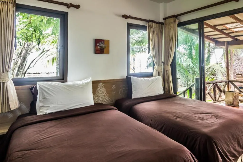Bed in Na Tara Resort