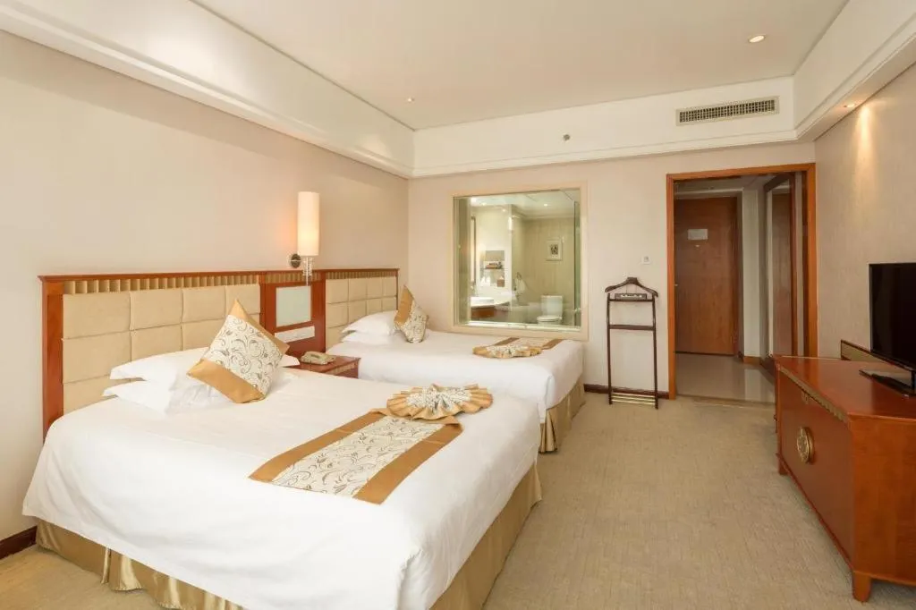 Bed in Zhangjiajie Qinghe Jinjiang International Hotel