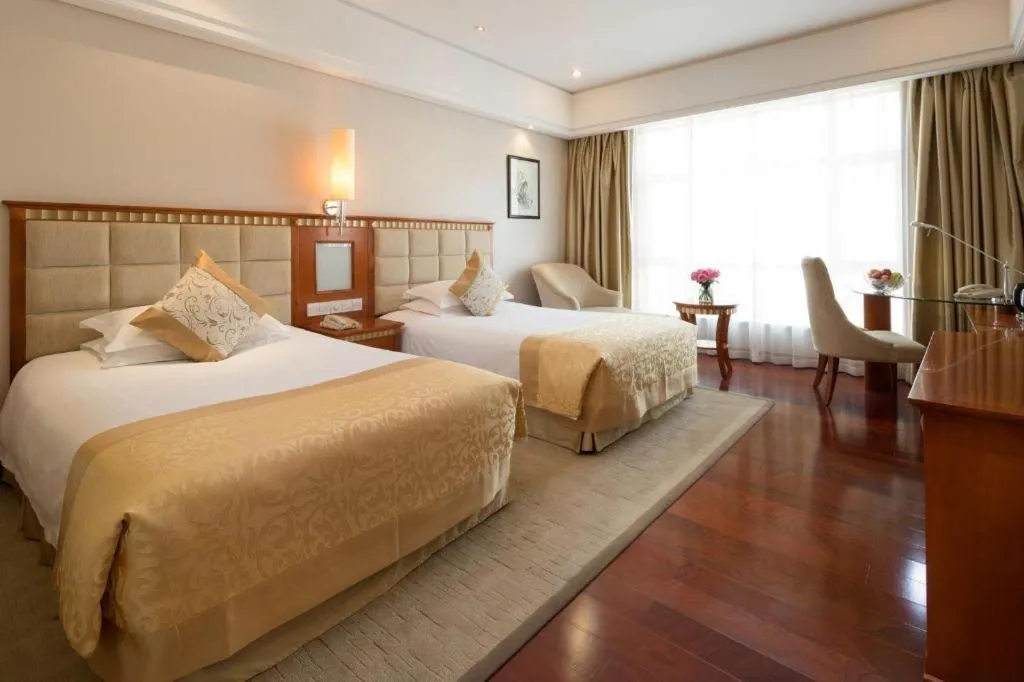 Bed in Zhangjiajie Qinghe Jinjiang International Hotel