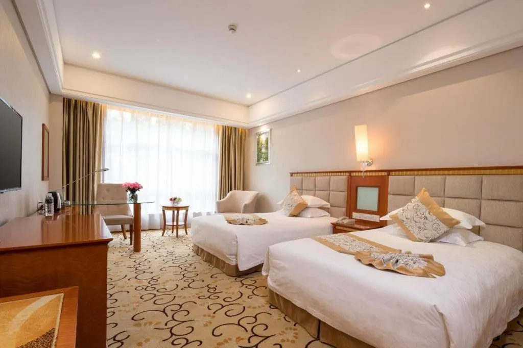 Bed in Zhangjiajie Qinghe Jinjiang International Hotel