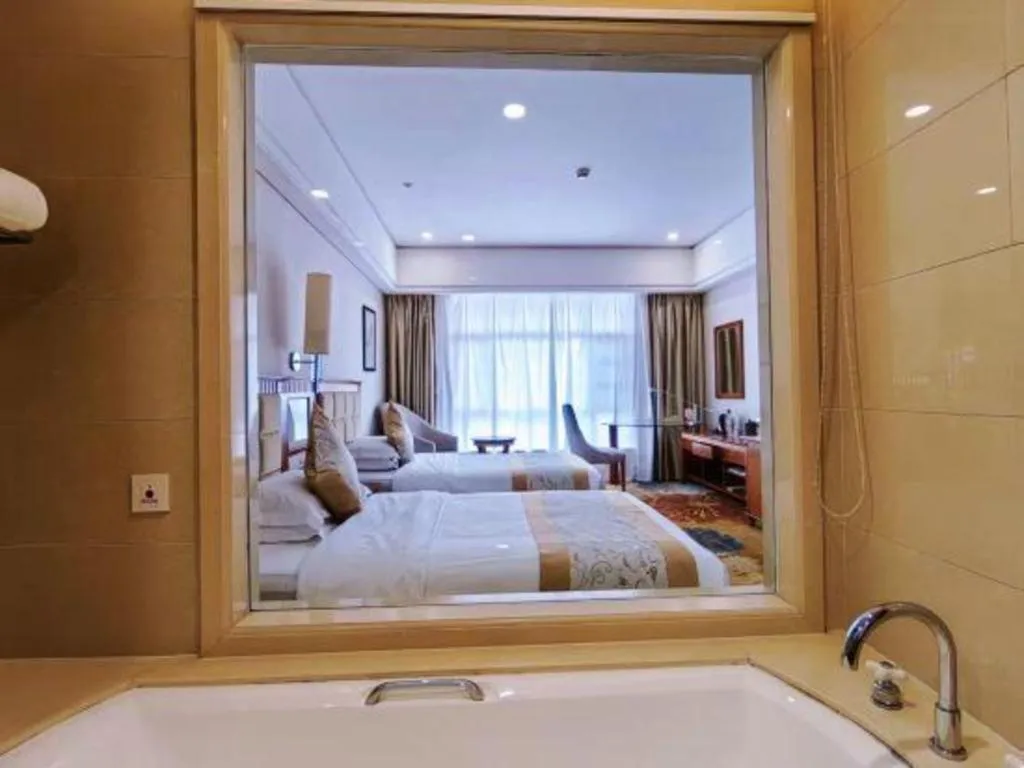 Bed in Zhangjiajie Qinghe Jinjiang International Hotel