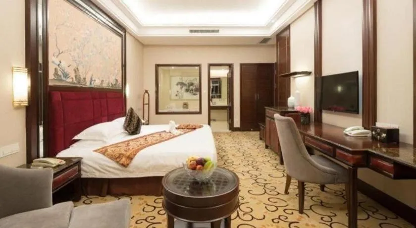Bed in Zhangjiajie Qinghe Jinjiang International Hotel