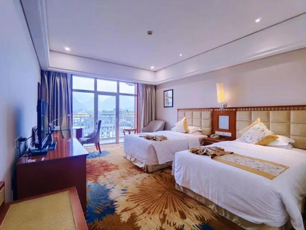 Bed in Zhangjiajie Qinghe Jinjiang International Hotel