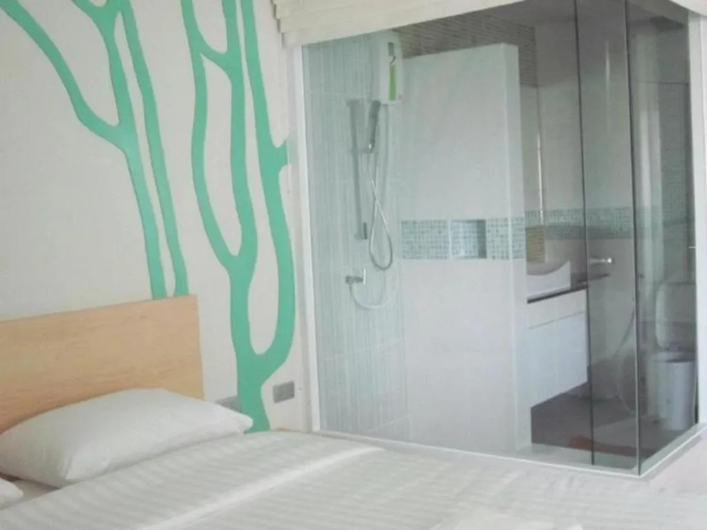 Bed in R-Con Blue Ocean Hotel