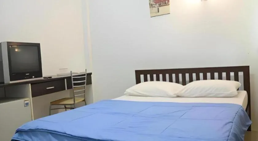 Bed in Chinawat Hotel