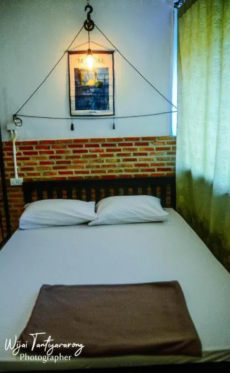 Bed in Chinawat Hotel