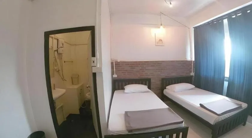 Bed in Chinawat Hotel