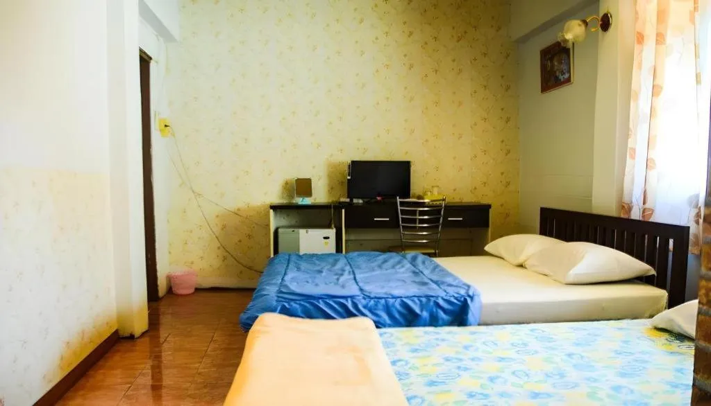 Bed in Chinawat Hotel