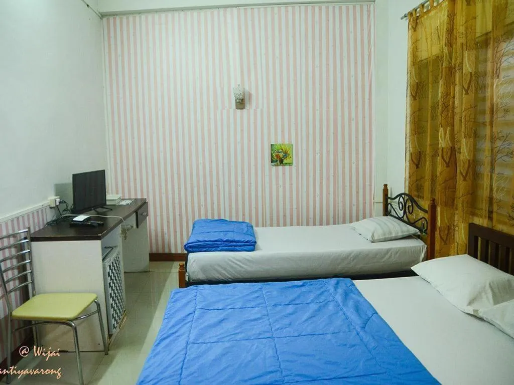 Bed in Chinawat Hotel