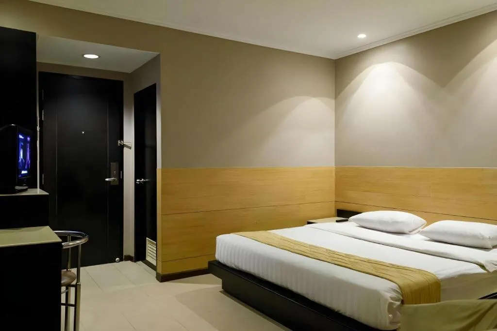 Bed in Gajahmada Avara Boutique Hotel