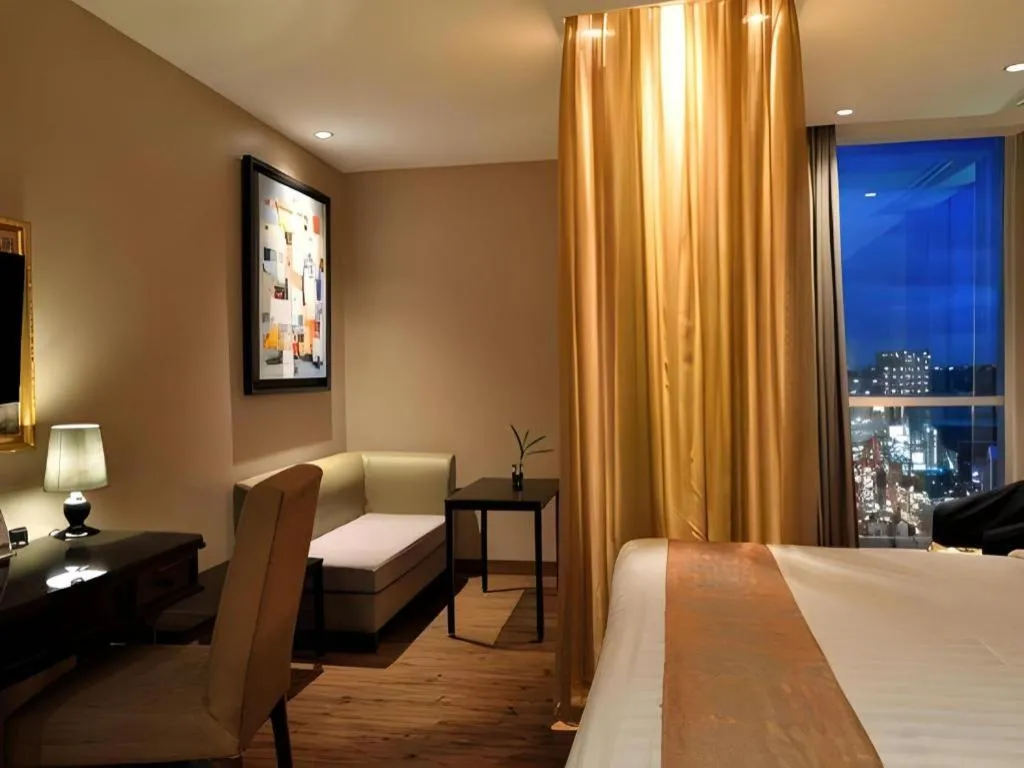 Bed in Gajahmada Avara Boutique Hotel