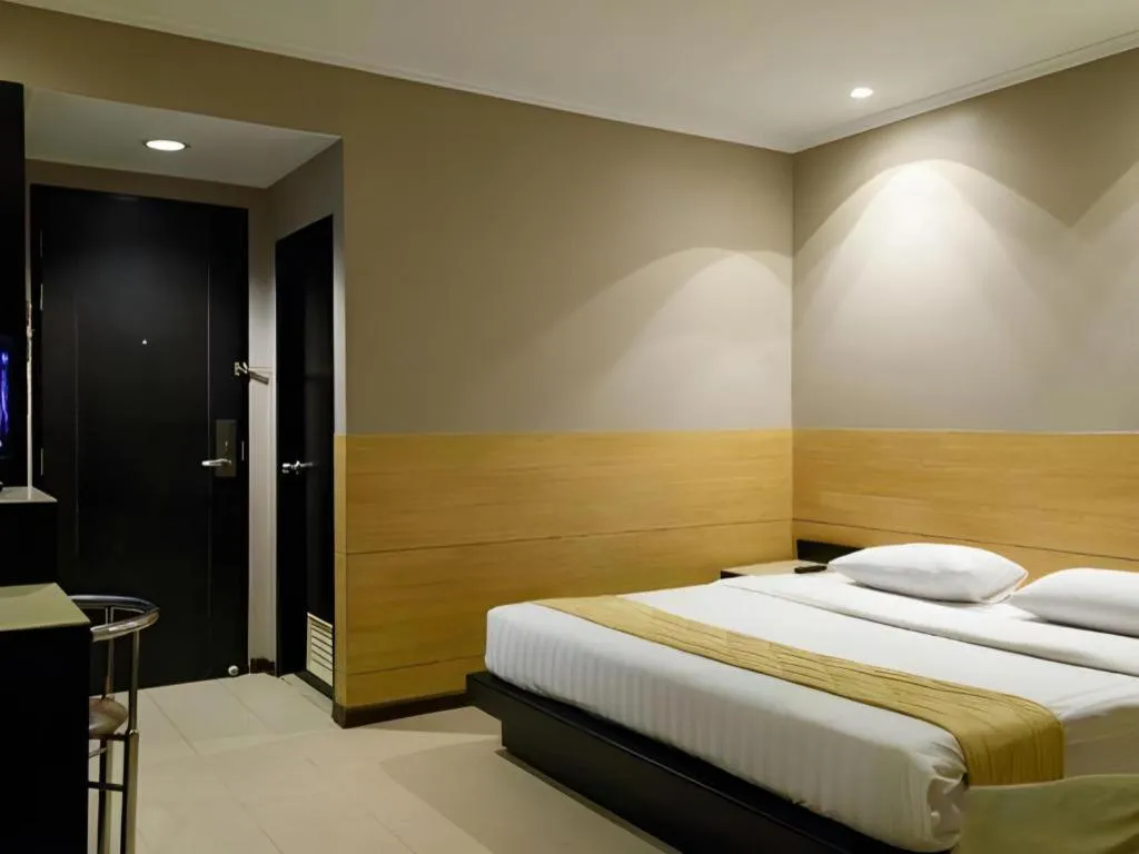 Bed in Gajahmada Avara Boutique Hotel