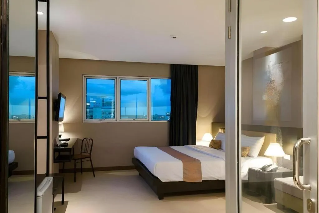 Bed in Gajahmada Avara Boutique Hotel