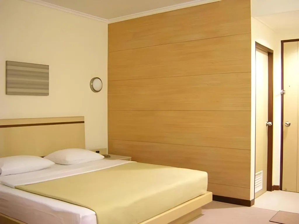 Bed in Gajahmada Avara Boutique Hotel