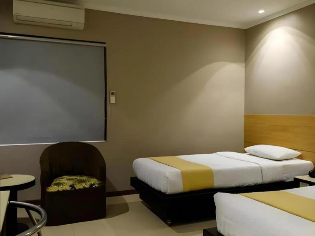 Bed in Gajahmada Avara Boutique Hotel