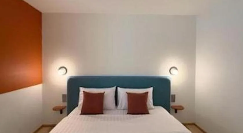 Bed in 777Bliss Hometel