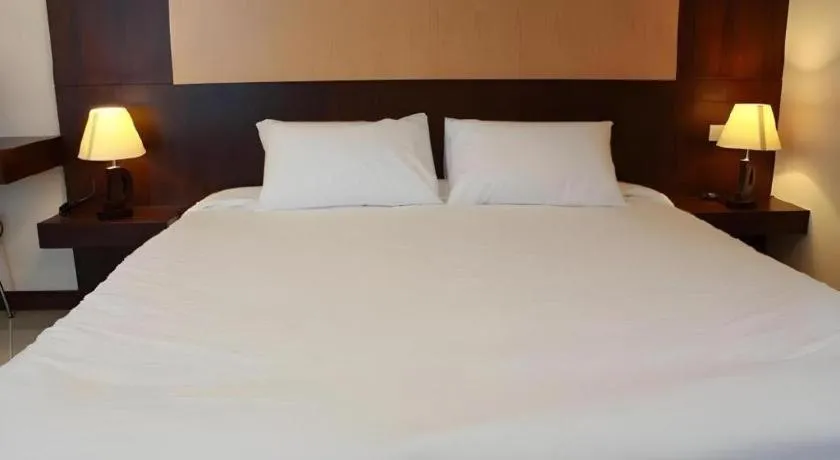 Bed in 777Bliss Hometel