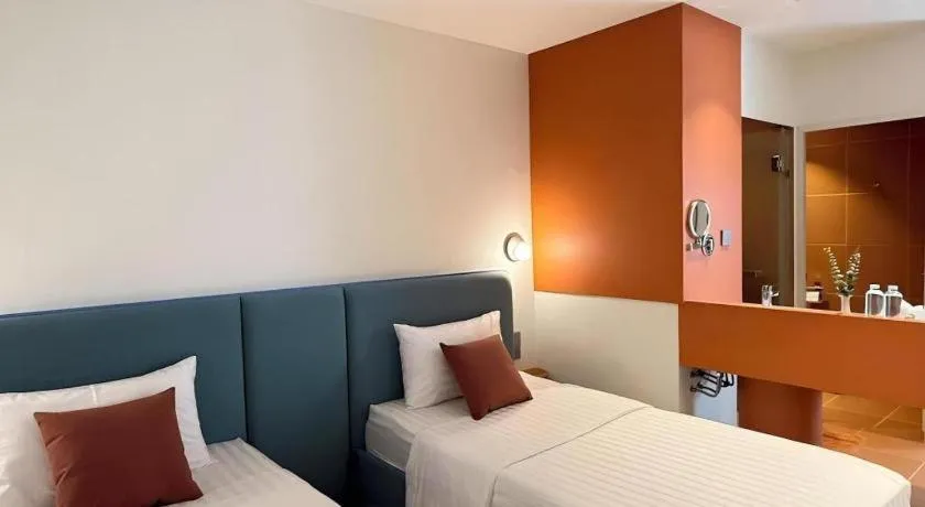 Bed in 777Bliss Hometel