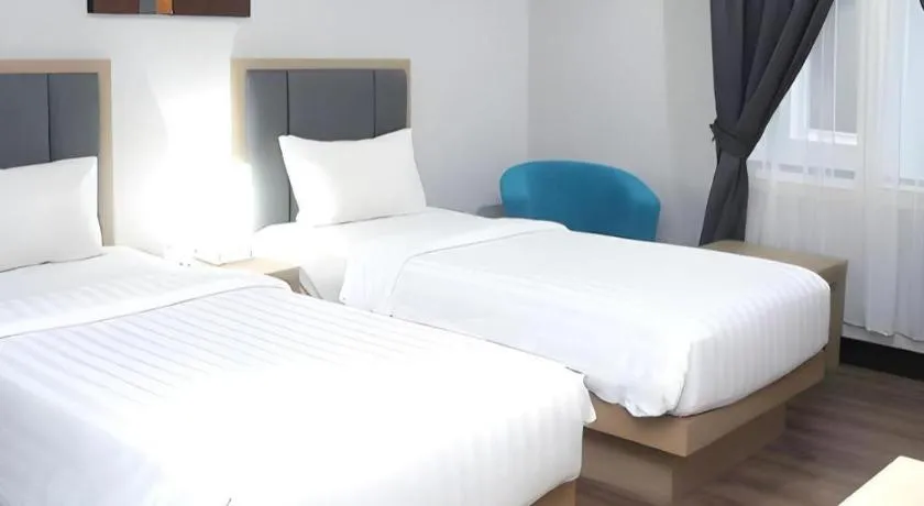 Bed in Orchardz Hotel Gajah Mada