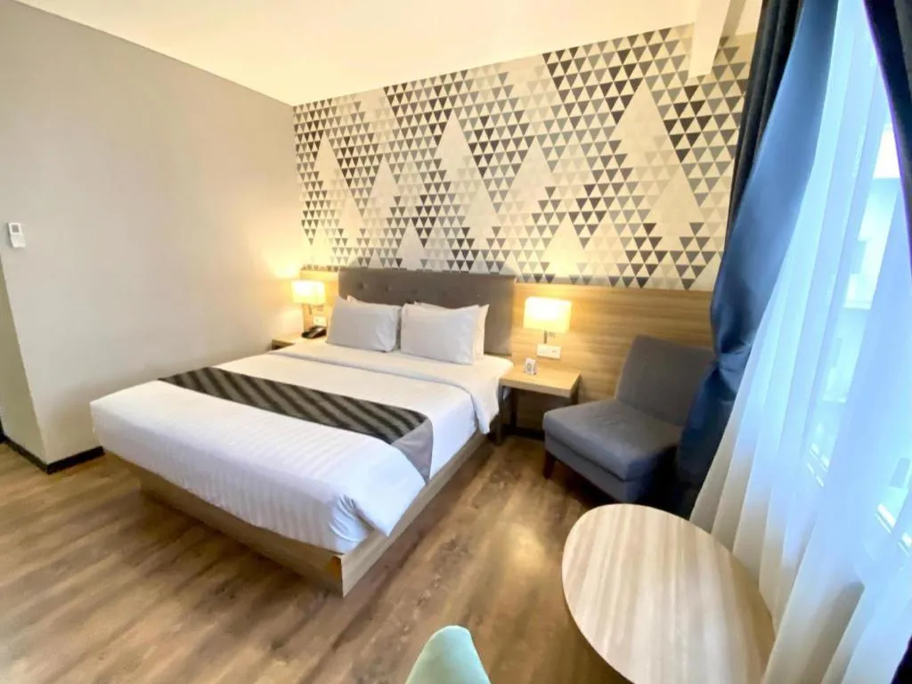 Bed in Orchardz Hotel Gajah Mada