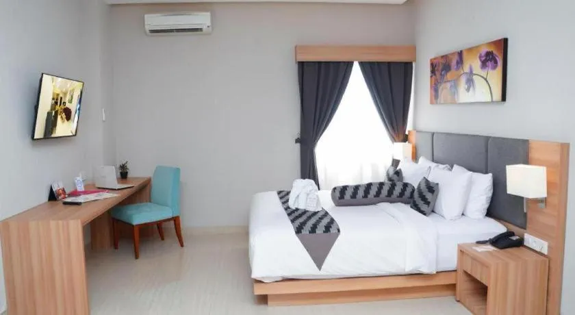 Bed in Orchardz Hotel Gajah Mada