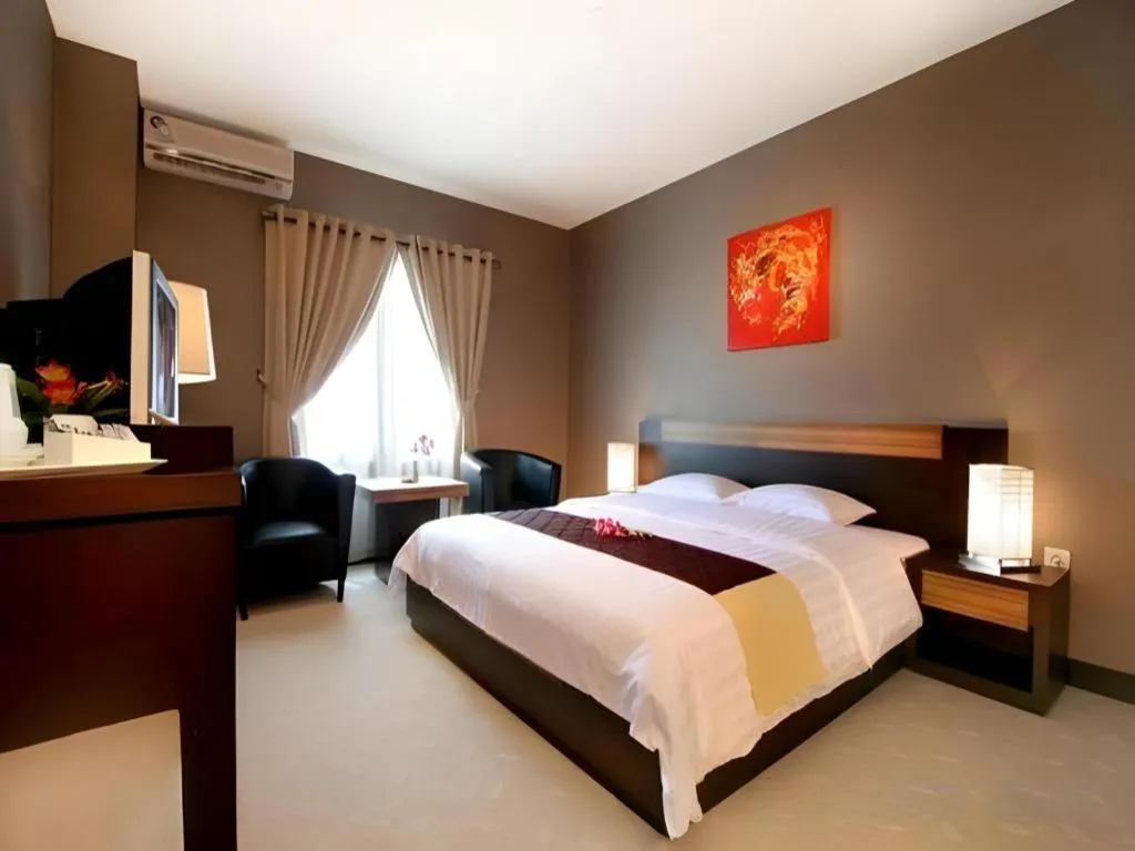 Bed in Orchardz Hotel Gajah Mada