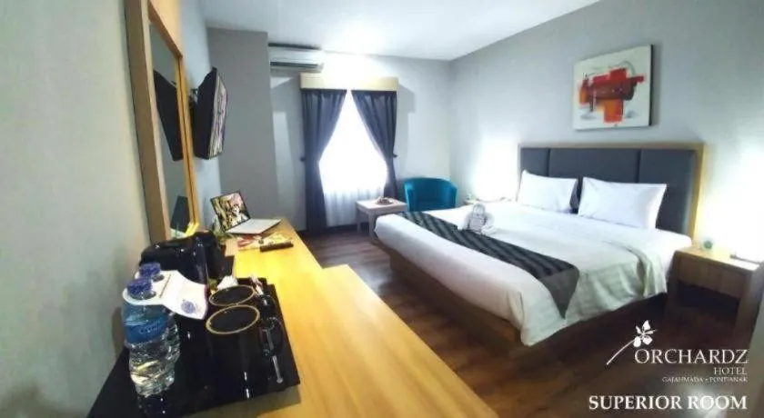 Bed in Orchardz Hotel Gajah Mada