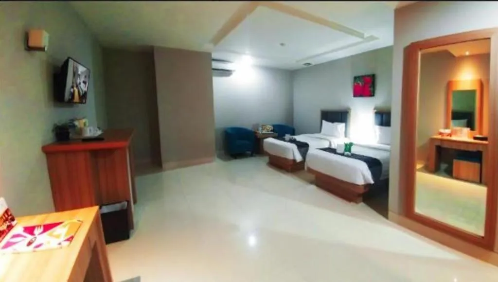 Bed in Orchardz Hotel Gajah Mada