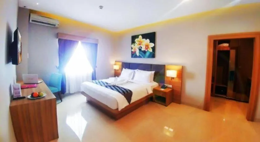 Bed in Orchardz Hotel Gajah Mada