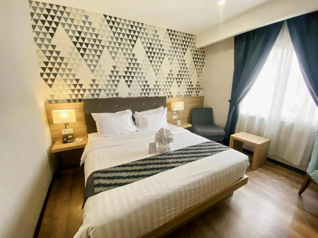 Bed in Orchardz Hotel Gajah Mada