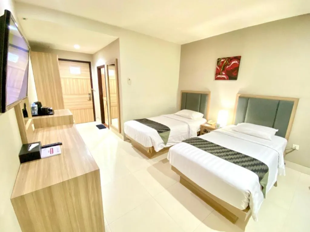 Bed in Orchardz Hotel Gajah Mada