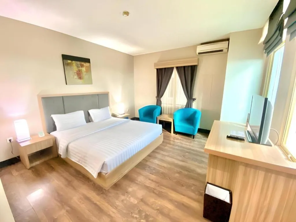 Bed in Orchardz Hotel Gajah Mada